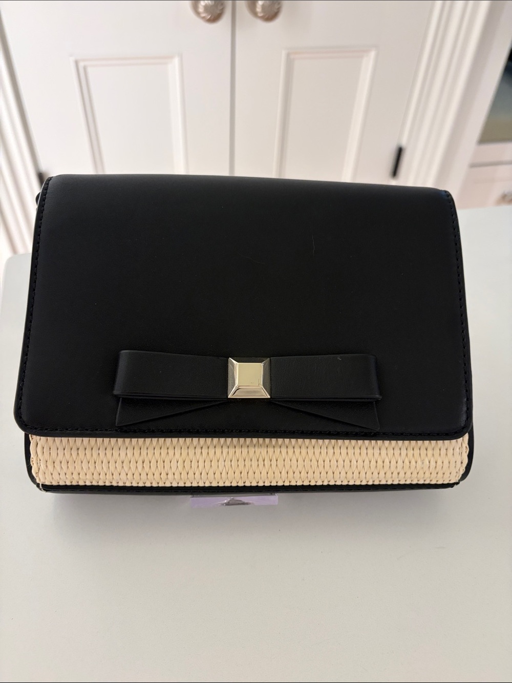 Kate Spade Black and Natural Bow Accent Crossbody Bag
